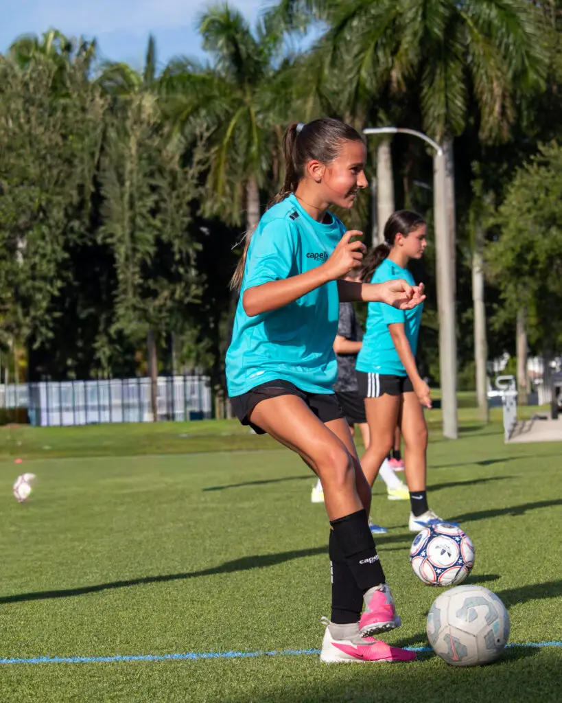 ACF Sunrise youth soccer player performing footwork drills on the turf at Nob Hill Soccer Park
